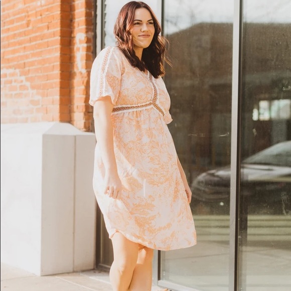 The Kenley detail empire waist in peach. - Picture 2 of 5